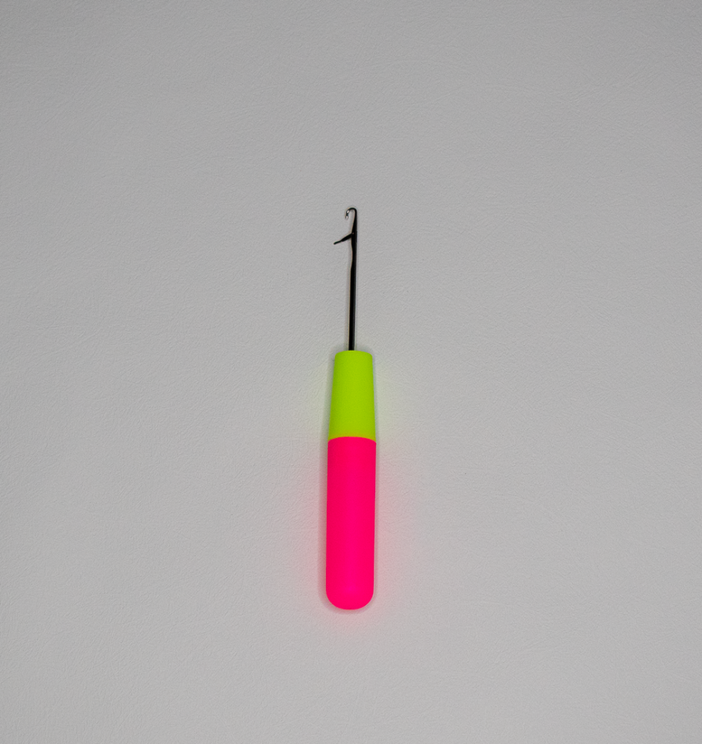Pink crochet Hook in white background