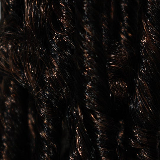 Closeup of product image of The Butterfly Loc in black and brown highlights or colour T30